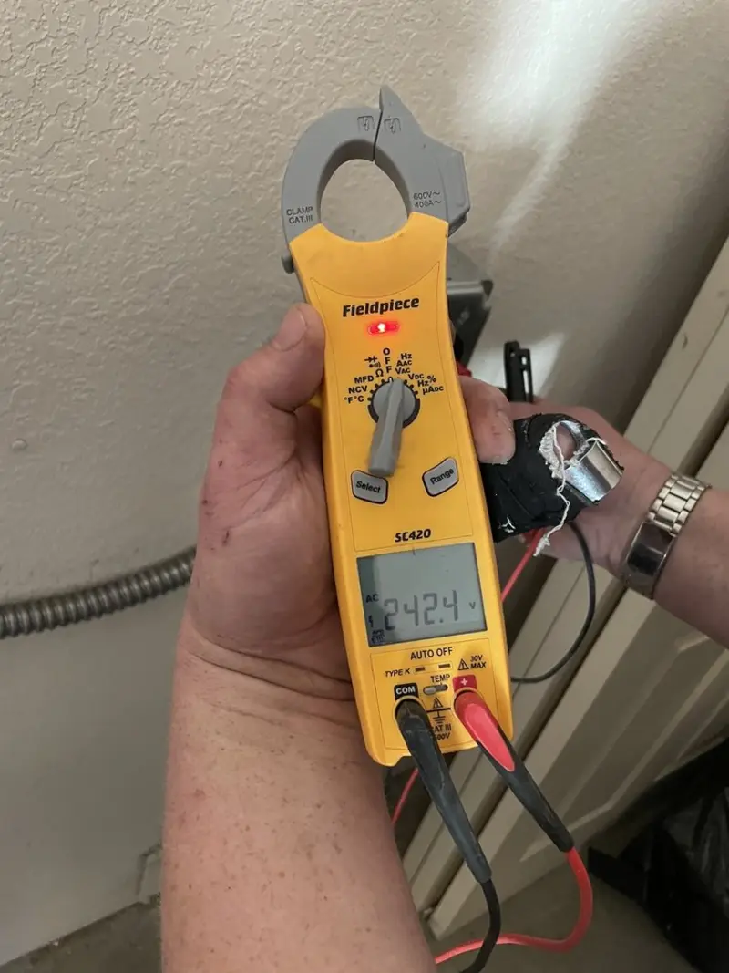Voltage testing with clamp meter during Hot Tub / Pool Electrical Wiring in Manhattan